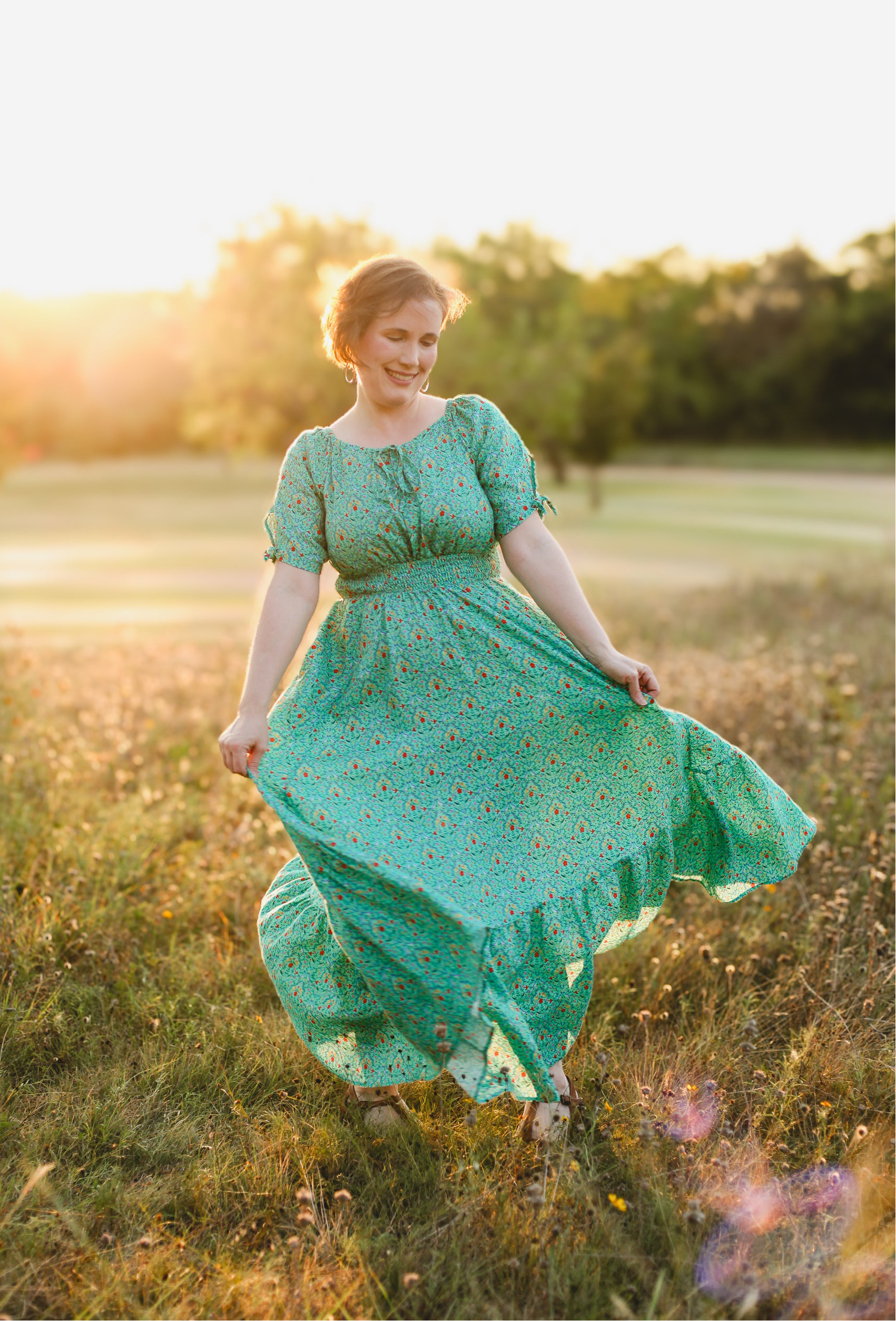 woman wearing a modest nursing green dress