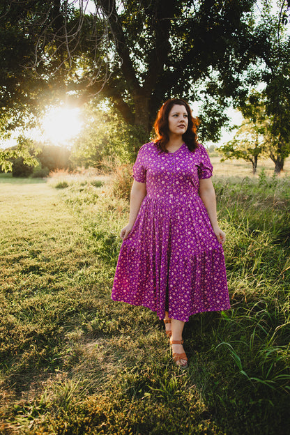 Woman in modest nursing floral dress outdoors