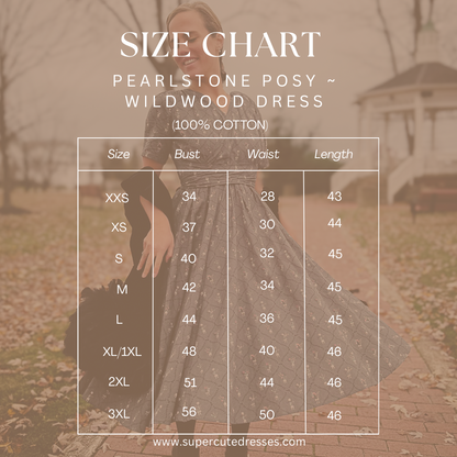 Size chart for a dress with a blurred background of a person wearing the dress outdoors.