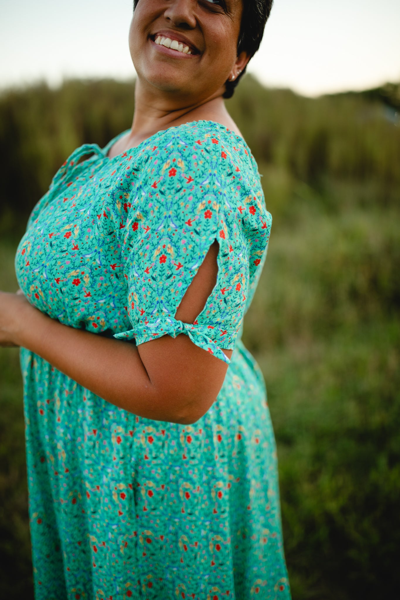 Woman wearing modest nursing dress outdoors