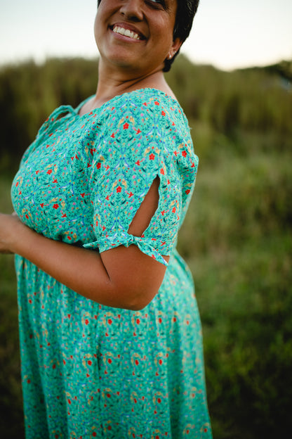 Woman wearing modest nursing dress outdoors