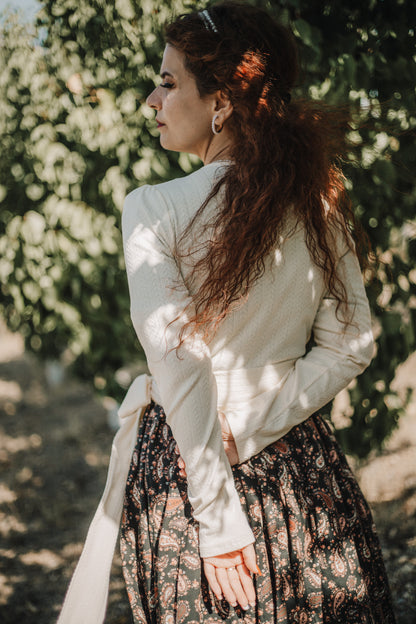 woman in a modest nursing dress outdoors