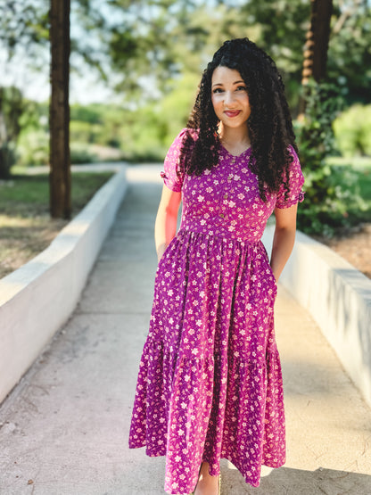 Woman in modest nursing floral dress outdoors