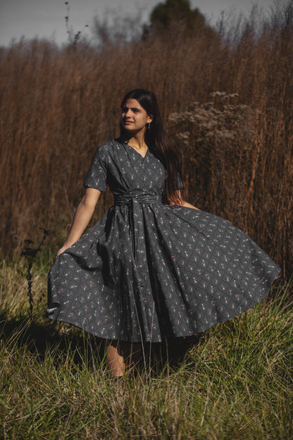 Modest nursing-friendly dark patterned dress in field