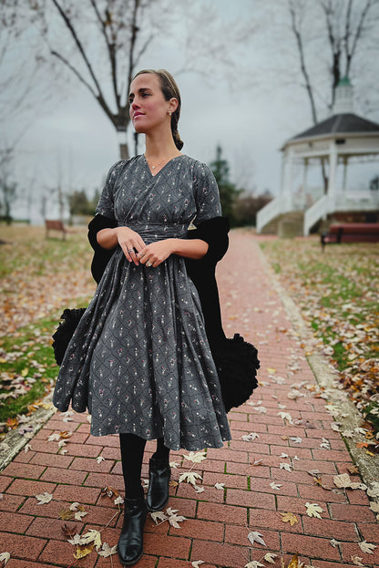 Modest nursing-friendly gray dress with black cardigan