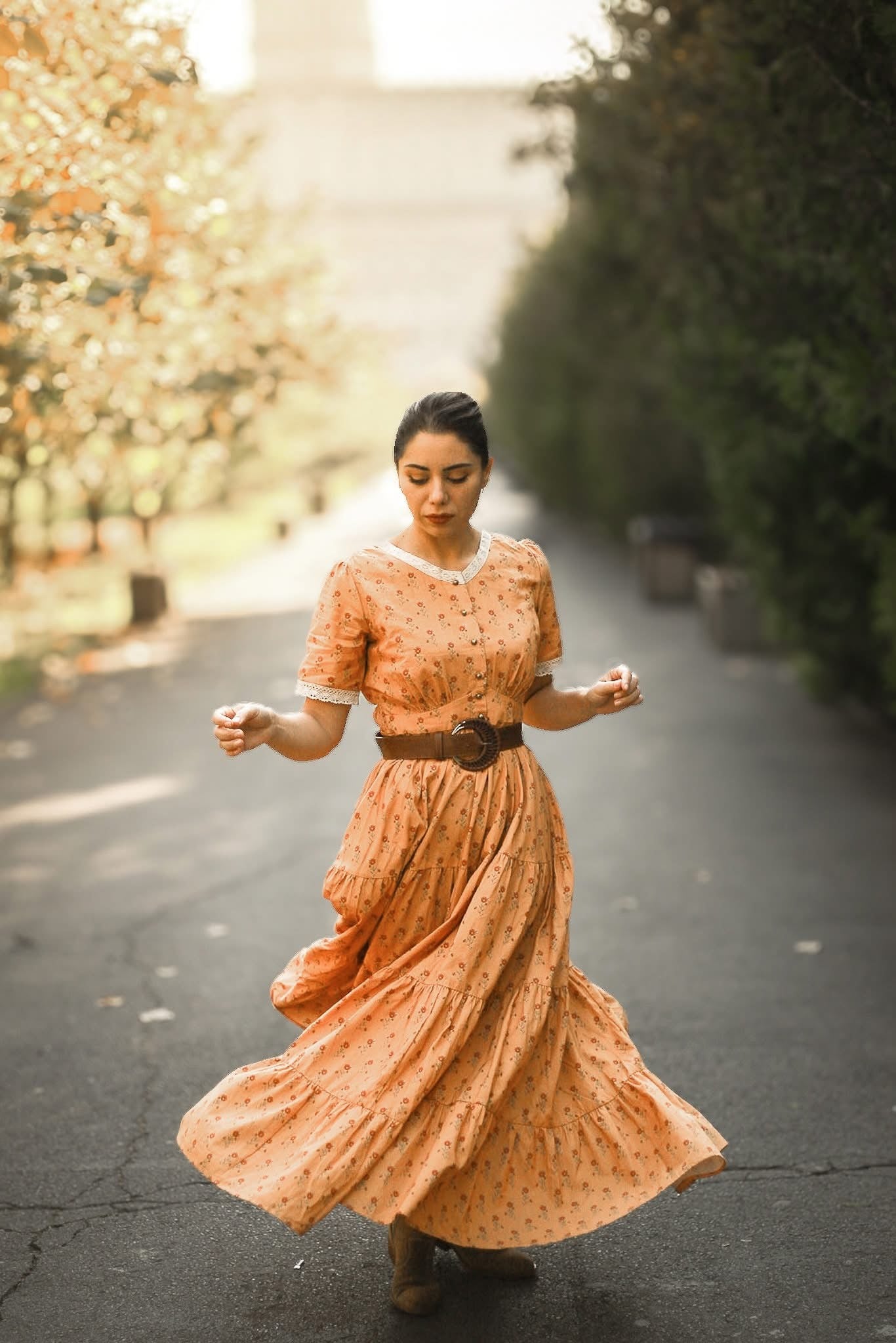 Woman in modest nursing dress walking street
