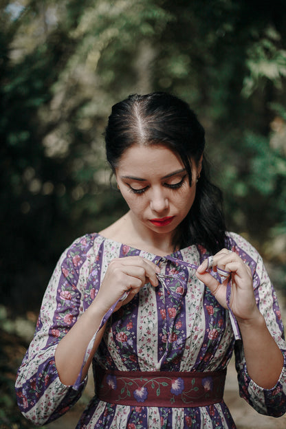 Woman in modest nursing floral dress
