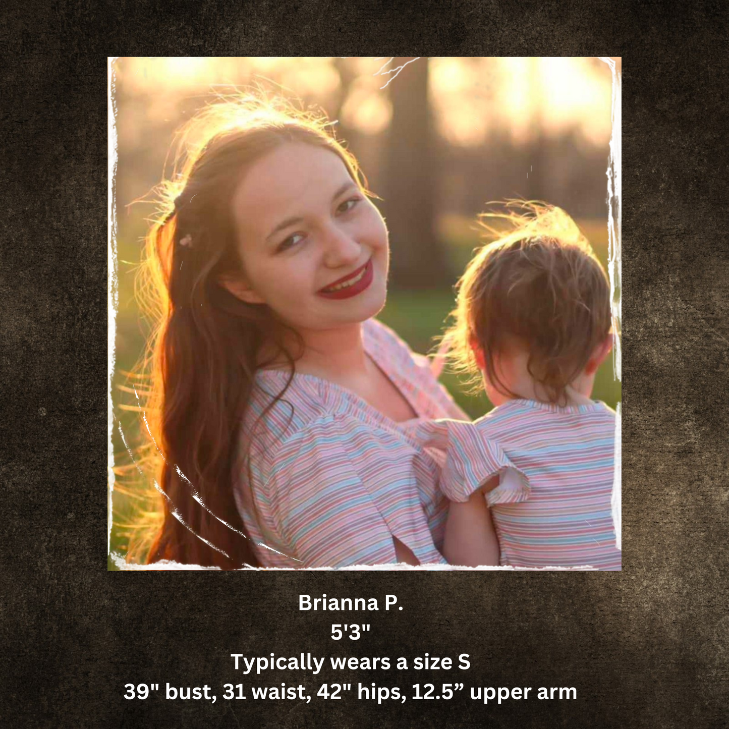 Mother in modest nursing dress holding child outdoors with warm glow