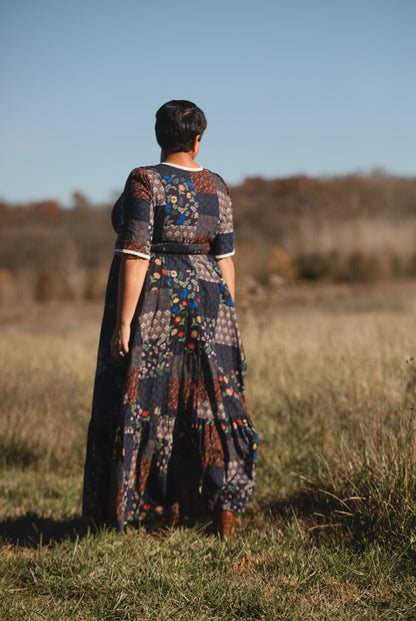 woman wearing a modest nursing patterned dress