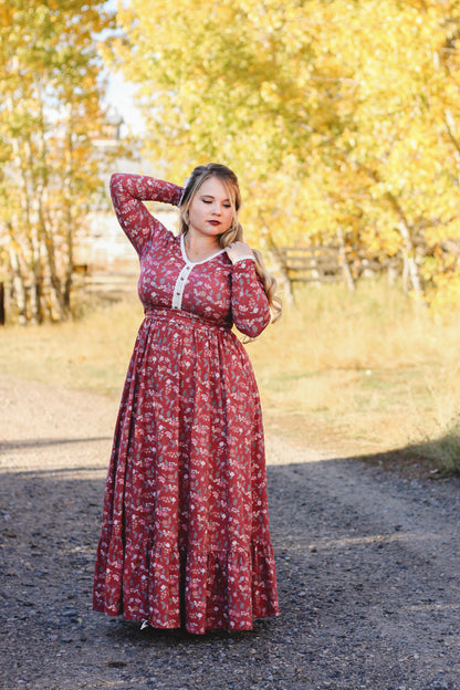Woman in modest nursing red floral dress outdoors