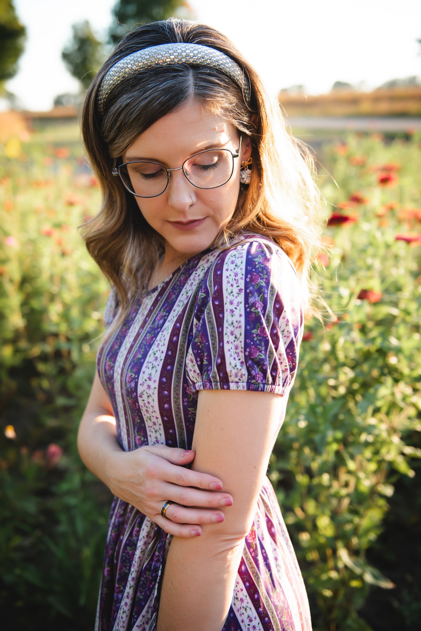 woman wearing a modest nursing purple and white striped dress