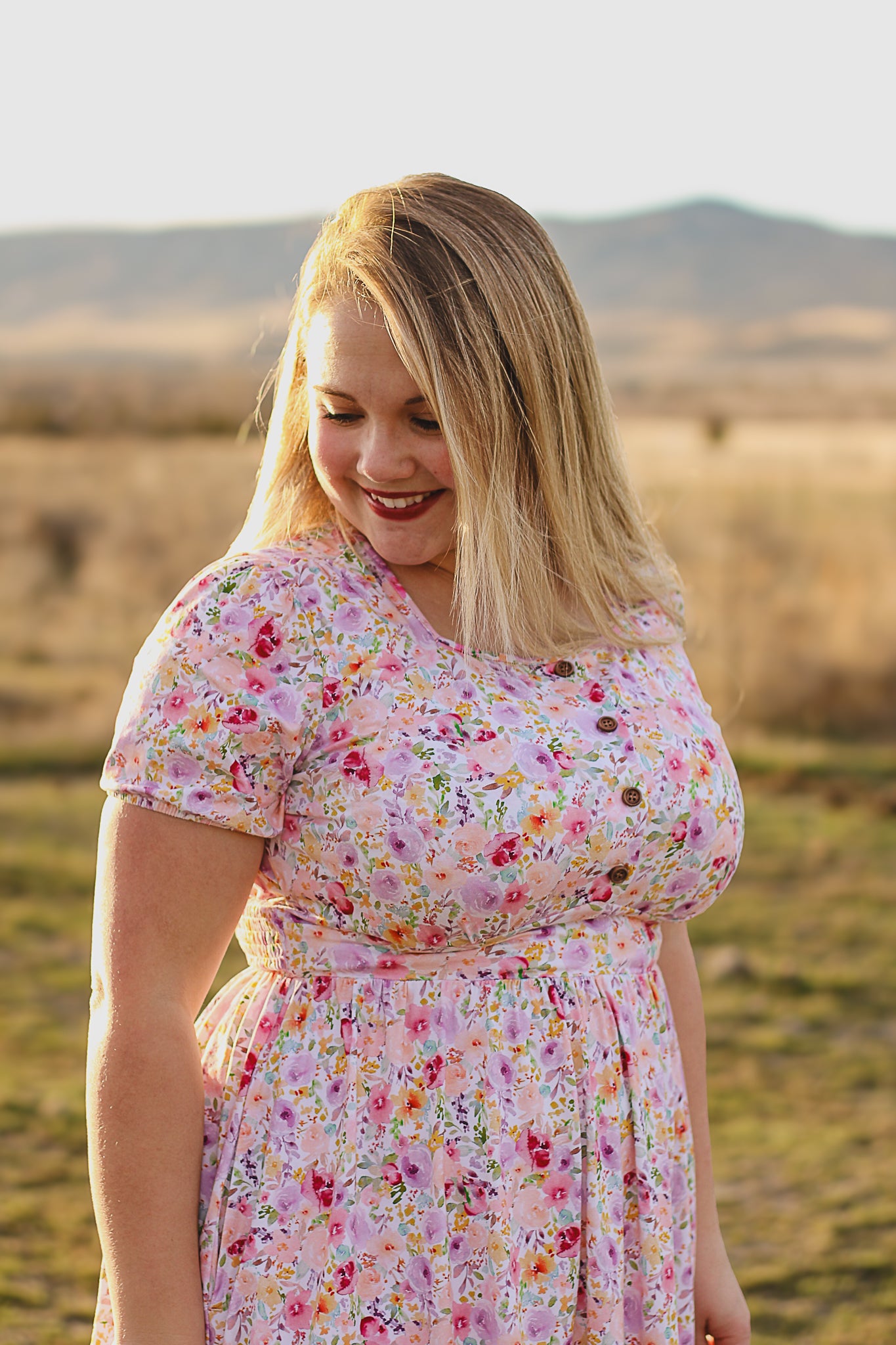 woman wearing a modest nursing floral dress