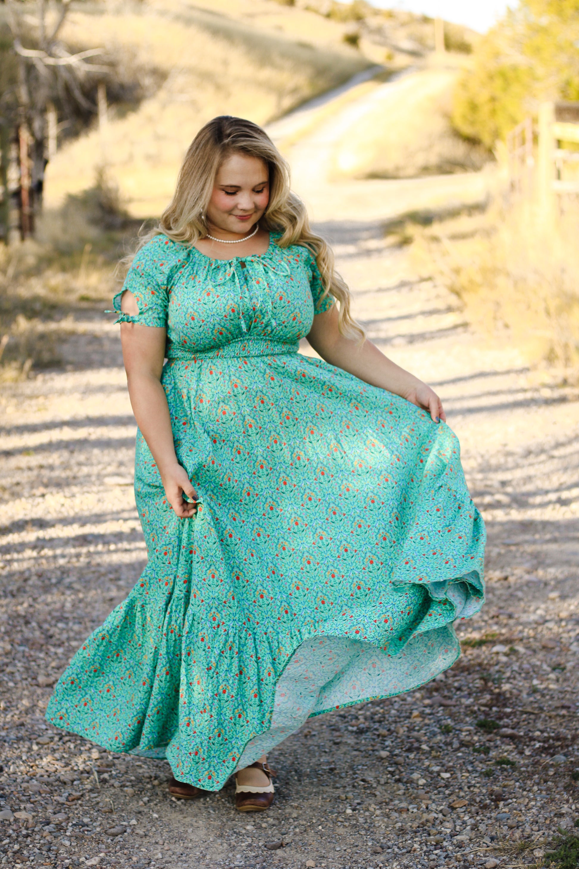 woman wearing a modest nursing green dress