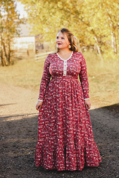 Woman in modest nursing red floral dress outdoors