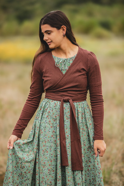 Woman in modest nursing outfit in natural setting