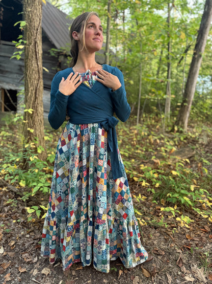Woman in modest nursing wrap and patchwork skirt