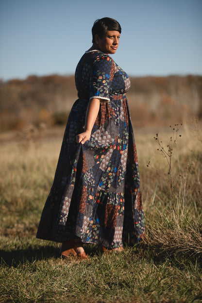 woman wearing a modest nursing patterned dress