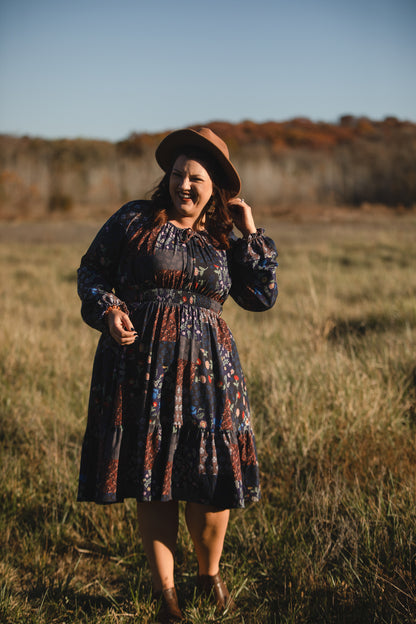 woman wearing a modest nursing floral dress