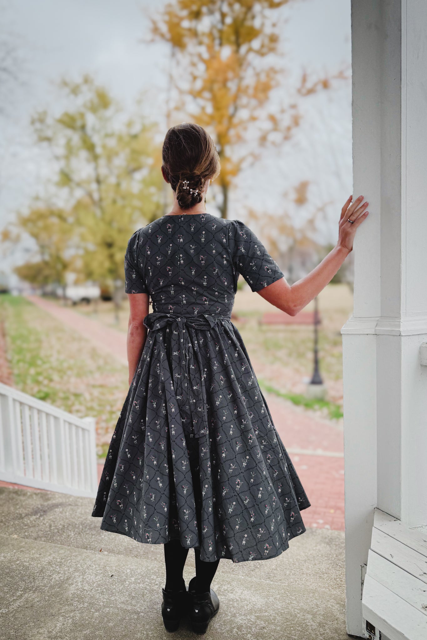 Modest nursing-friendly dark floral dress back view