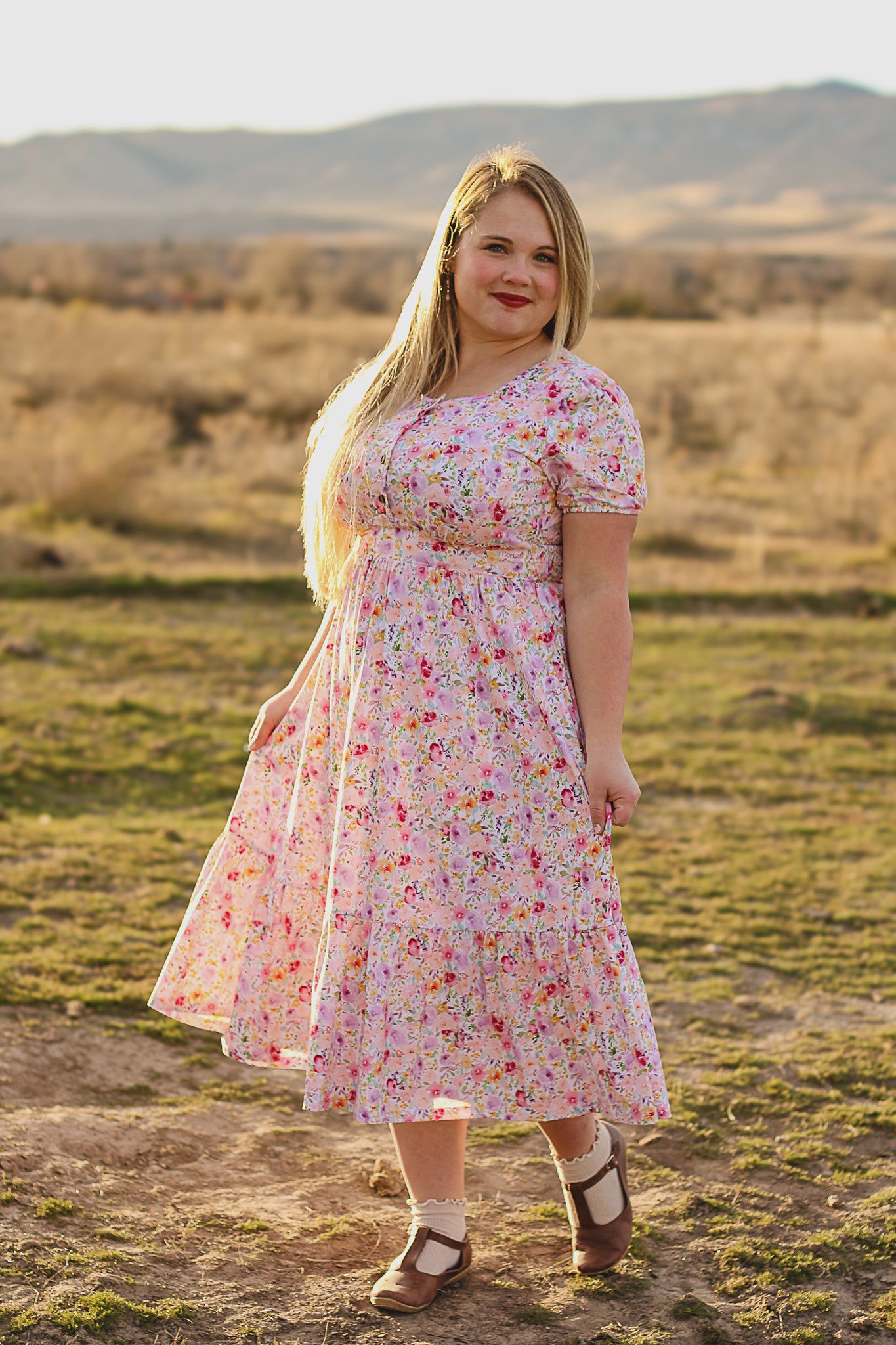 woman wearing a modest nursing floral dress
