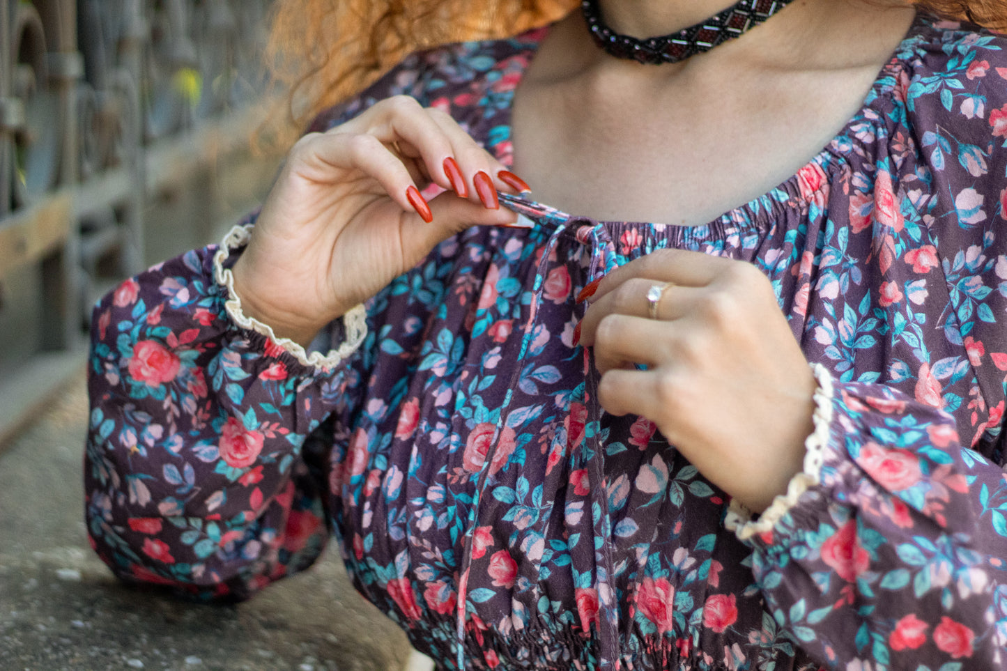Woman in modest nursing floral dress outdoors