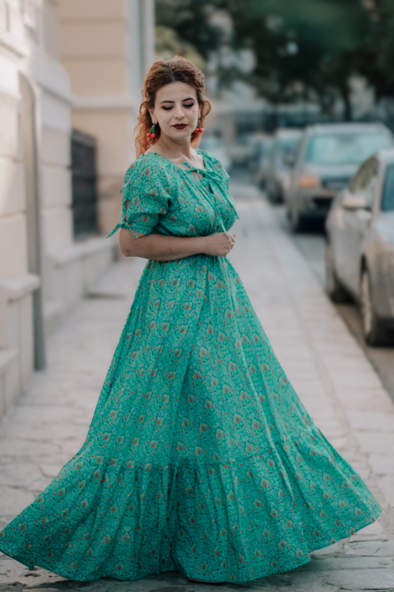 Woman in modest nursing dress on city street