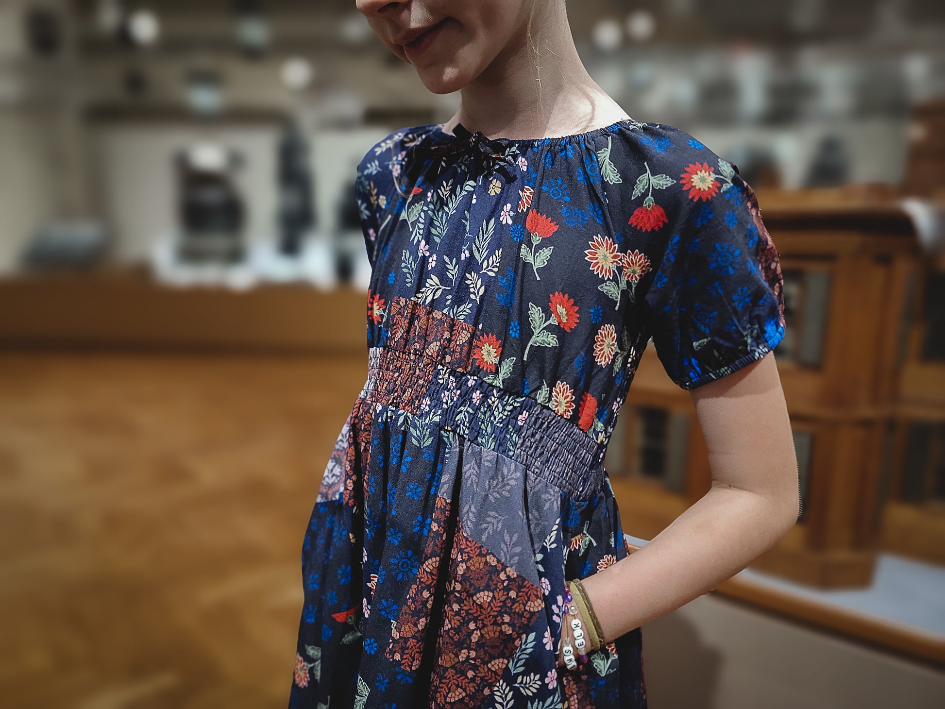 young girl wearing a cute patchwork dress