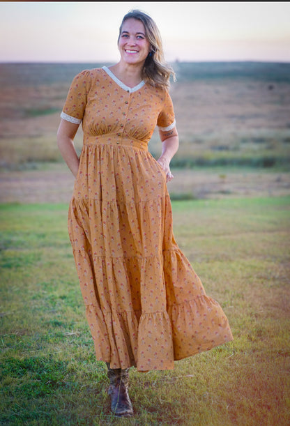 Woman in modest nursing dress field