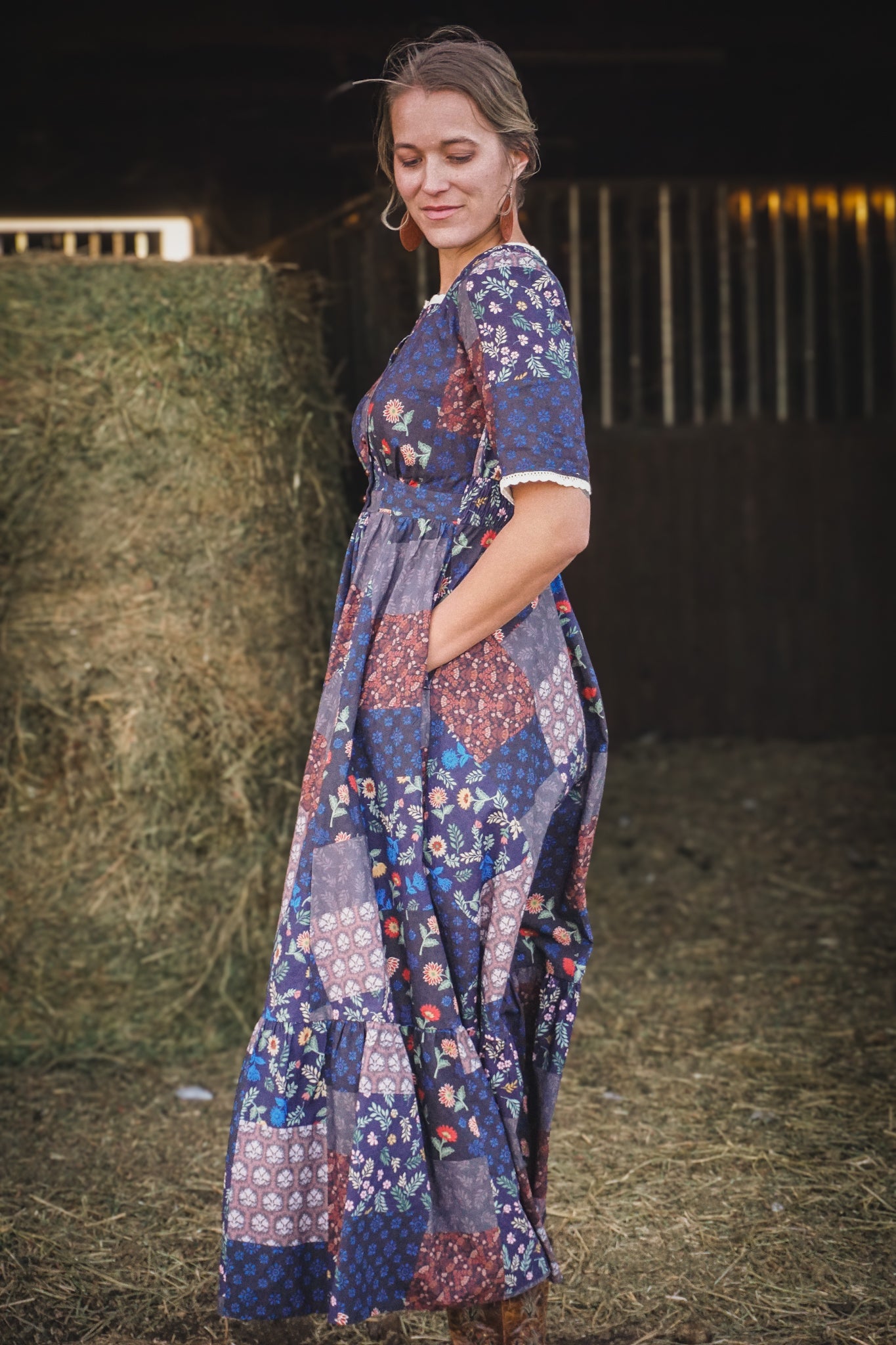 woman wearing a modest nursing patterned dress