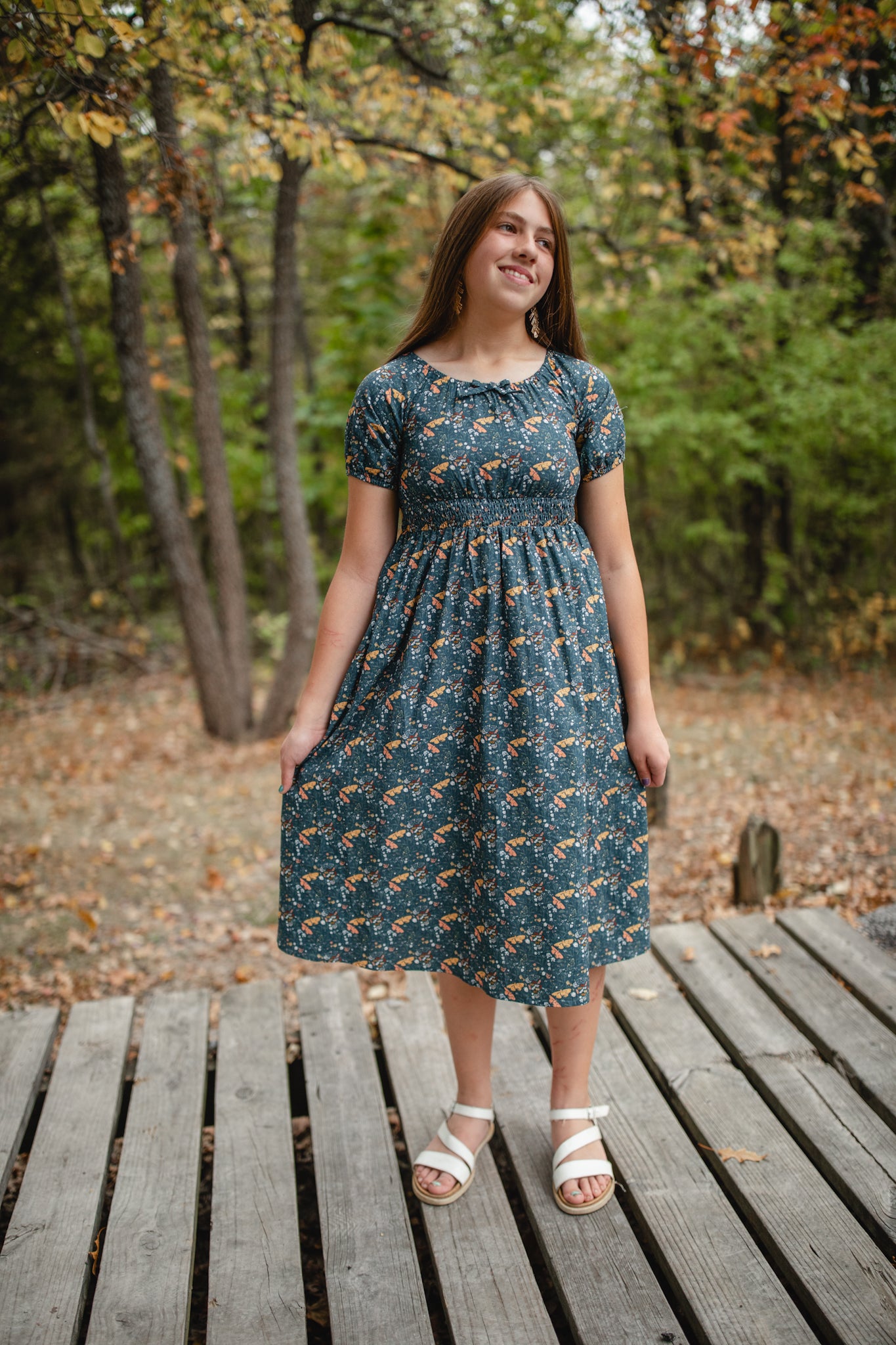 Woman in modest nursing dress outdoors