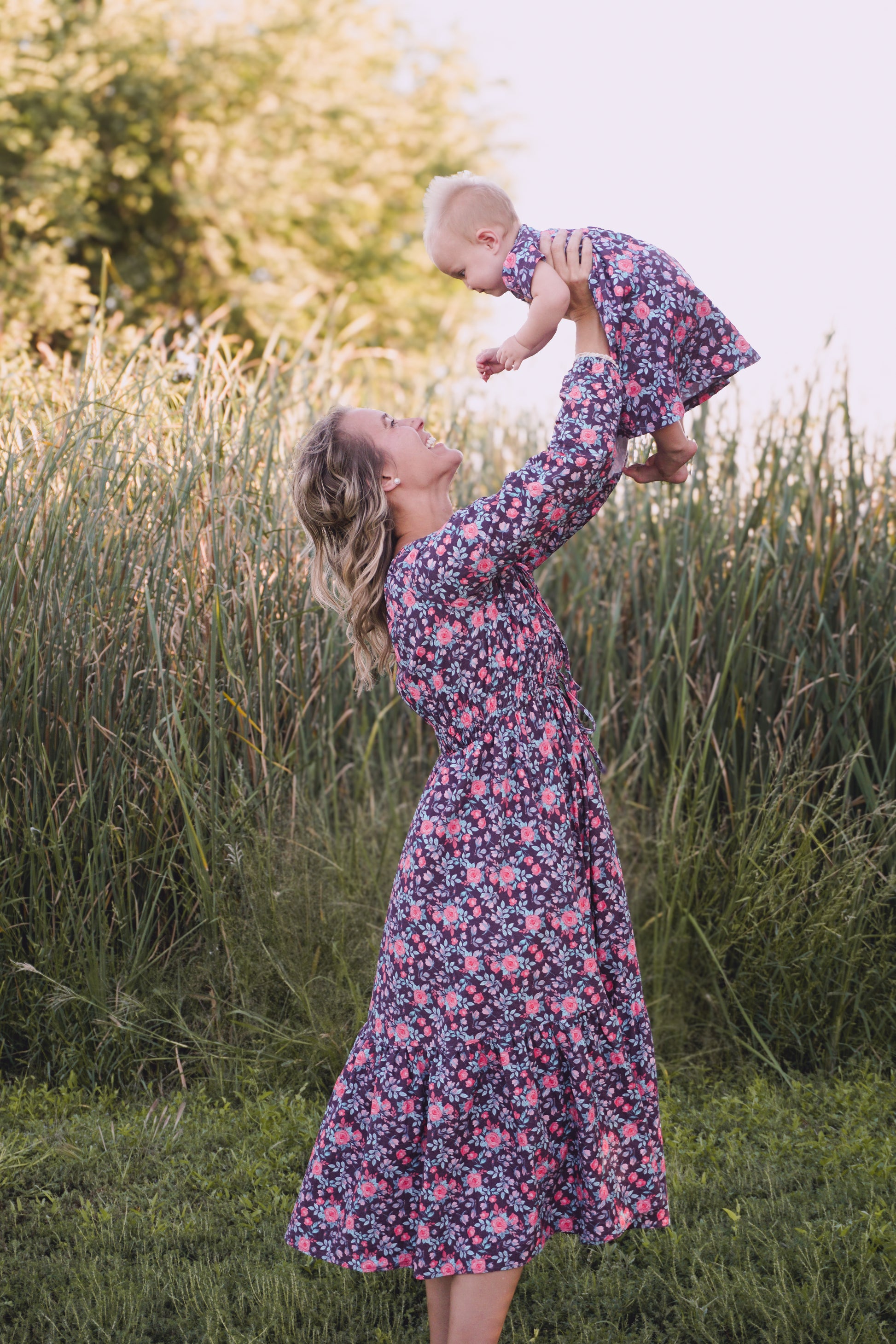 Woman in modest nursing floral dress outdoors