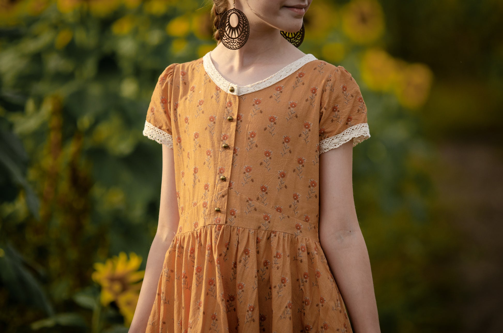 Woman in modest nursing dress with floral background