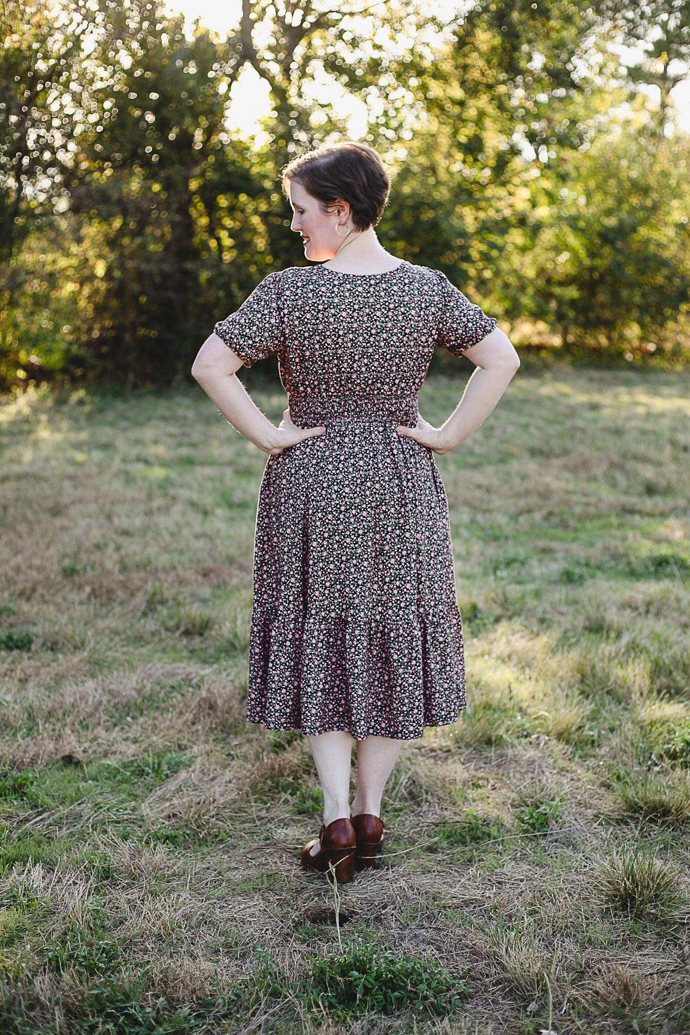 woman wearing a modest nursing floral dress