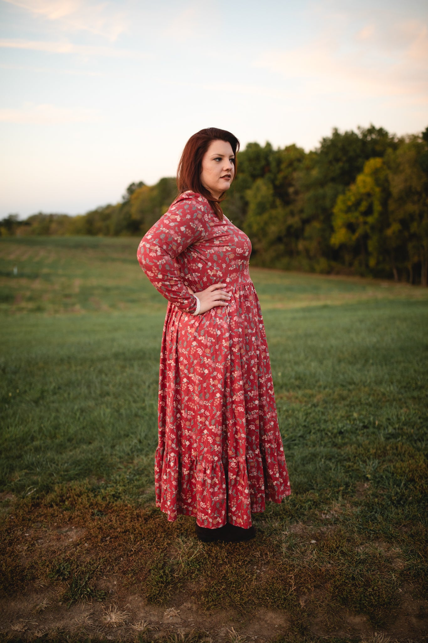 Woman in modest nursing red floral dress outdoors