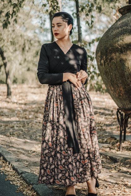 woman wearing a modest nursing black dress