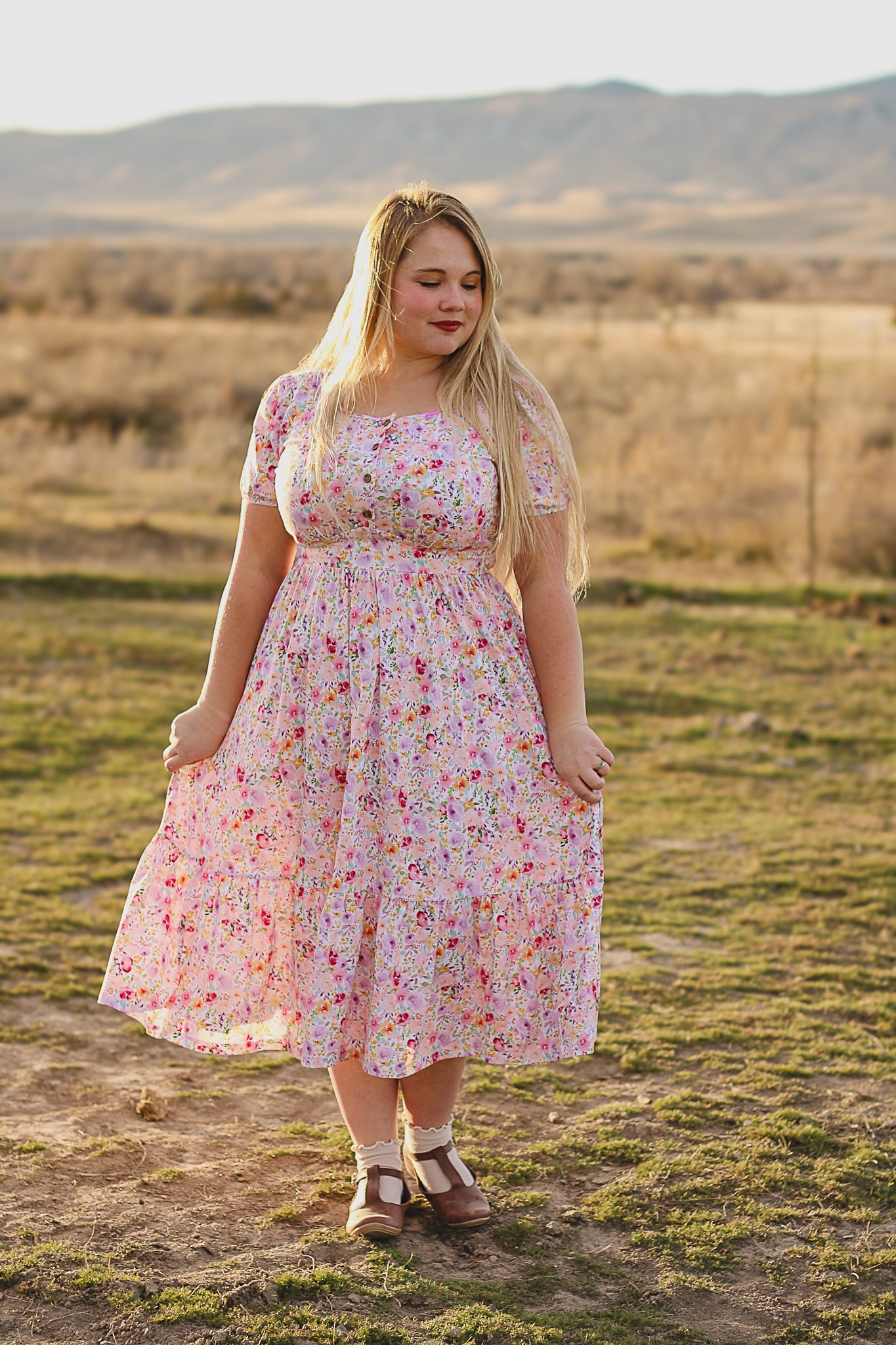 woman wearing a modest nursing floral dress