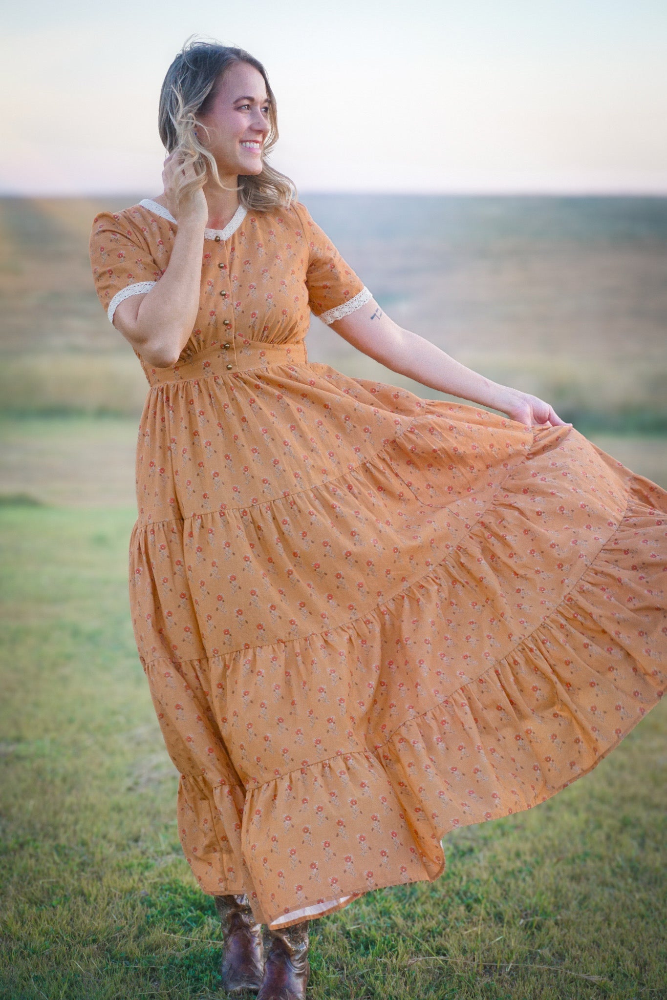 Woman in modest nursing dress field