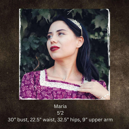 Woman in modest nursing purple dress with tiara