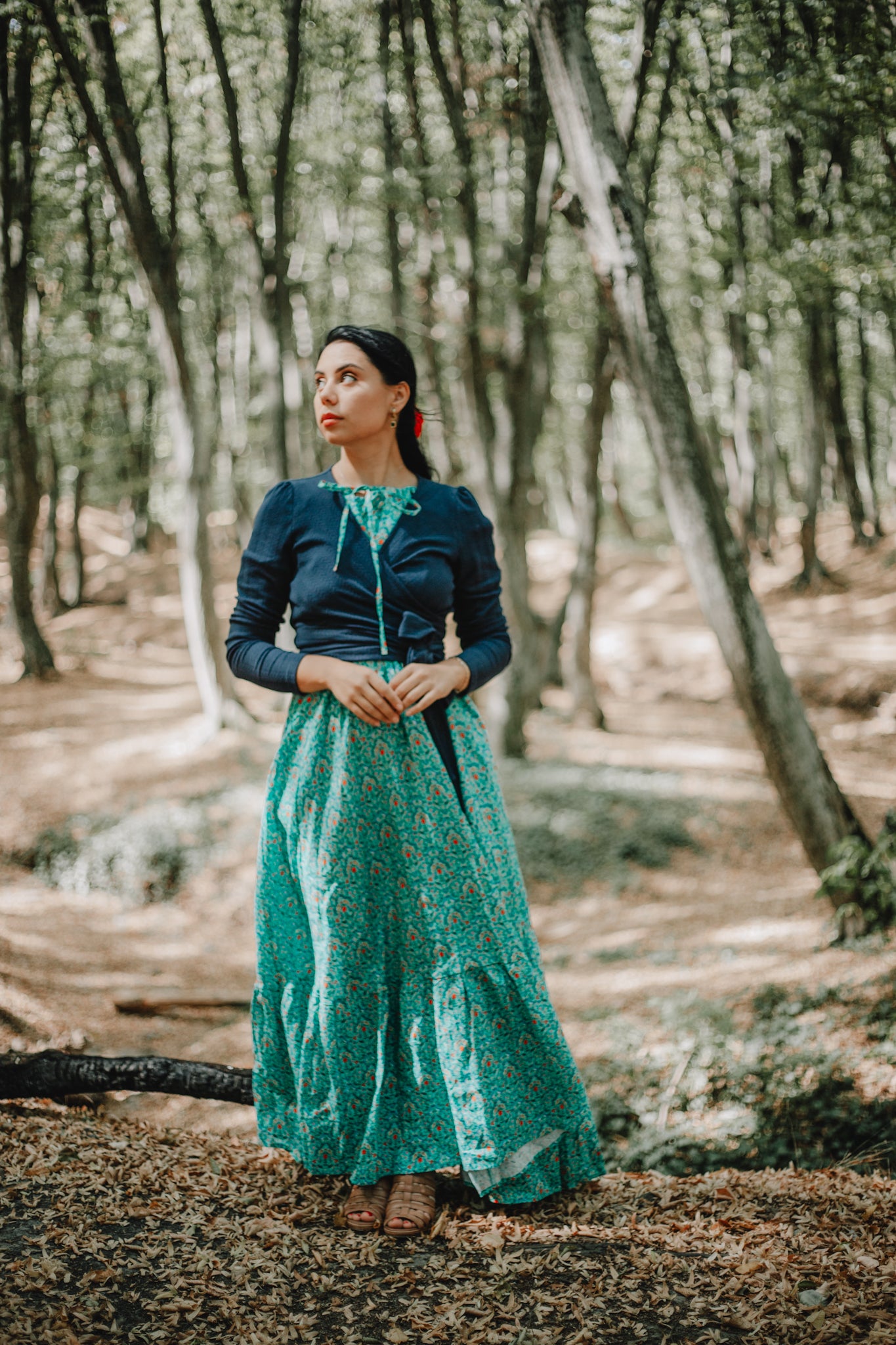 Woman in modest nursing green skirt outdoors