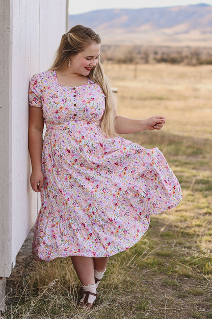 woman wearing a modest nursing floral dress