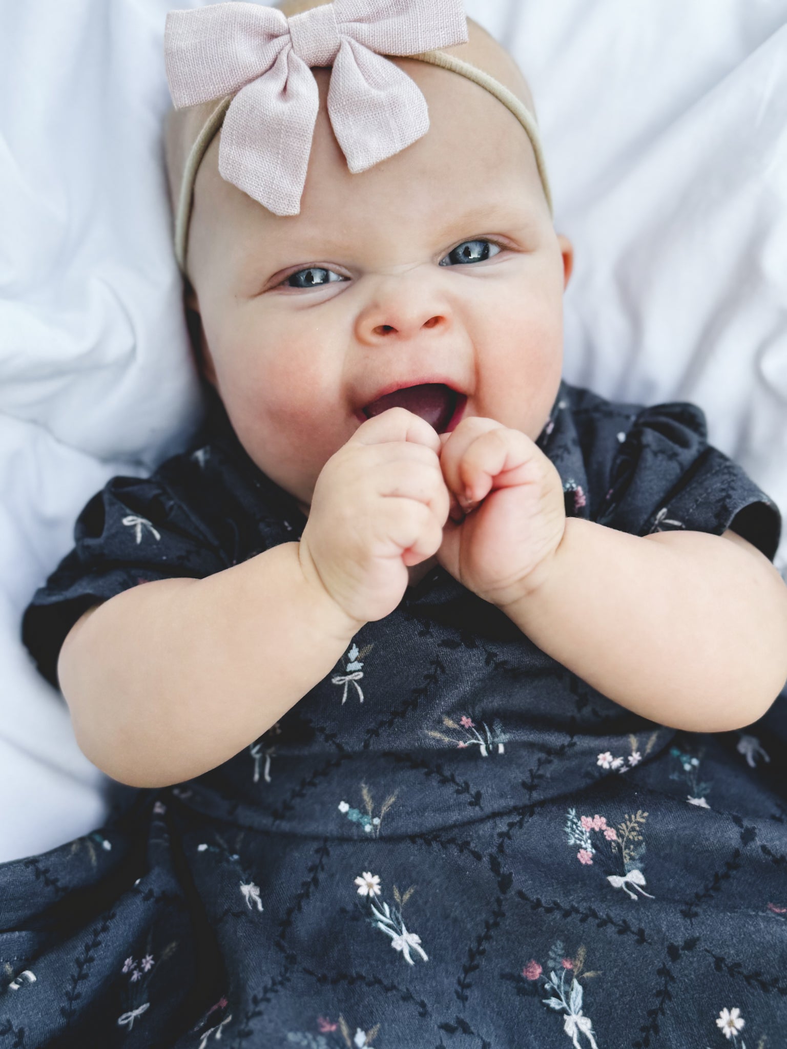 Modest baby in dark floral dress headband