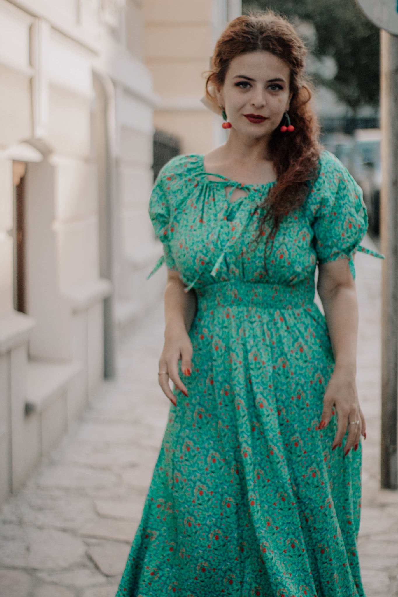 Woman in modest nursing green floral dress