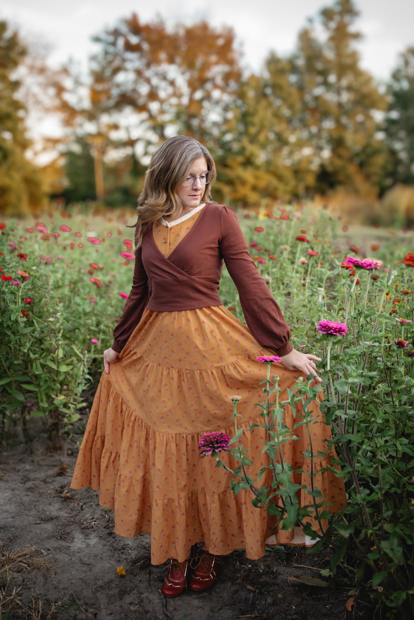 Woman in modest nursing dress in garden