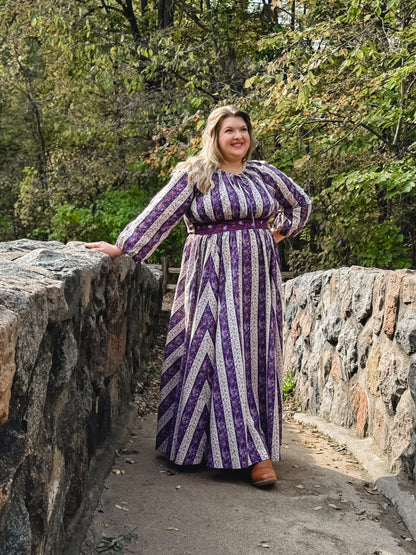 Woman in modest nursing patterned dress outdoors