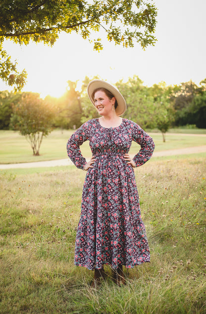 Woman in modest nursing dress outdoors