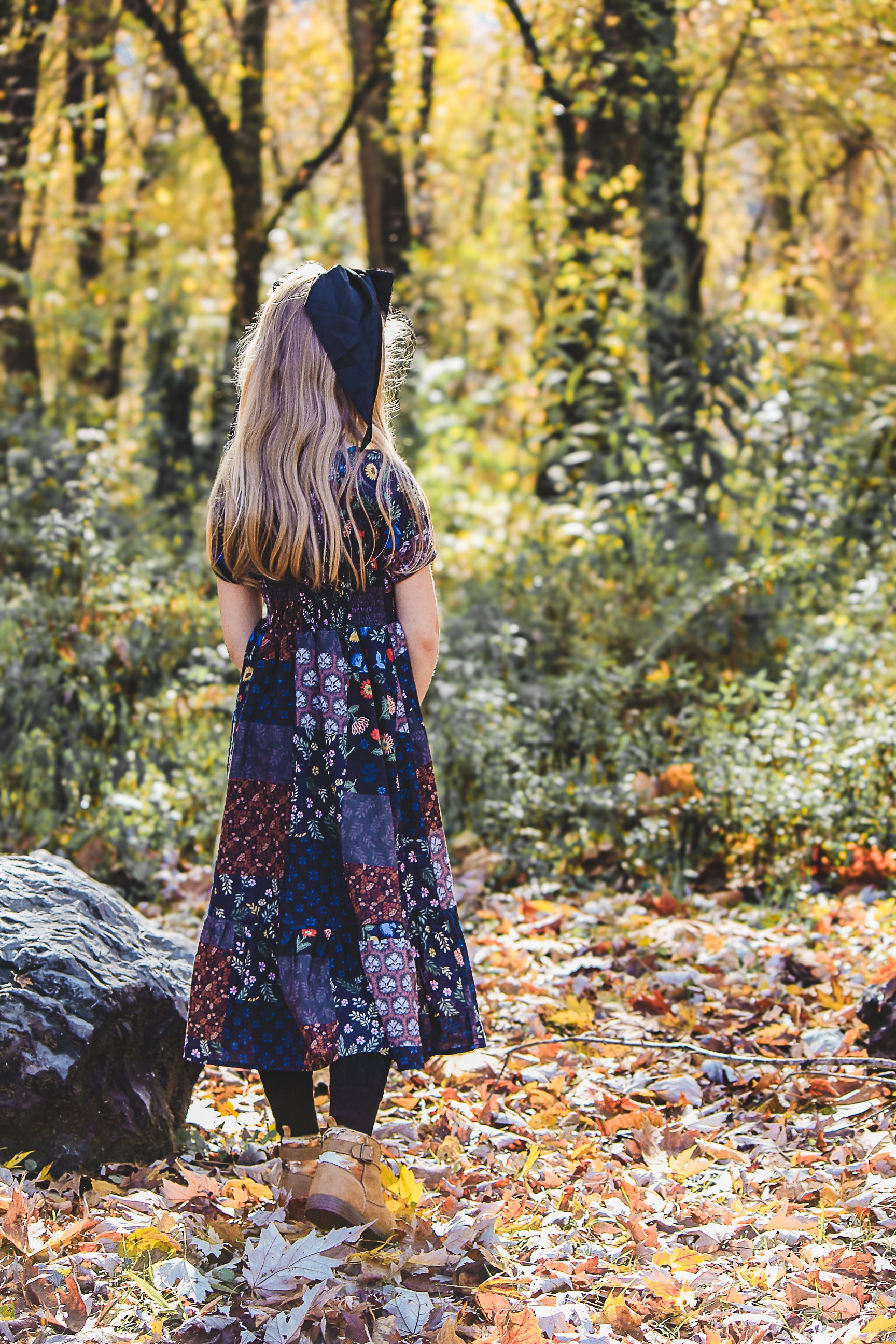 child wearing a cute patchwork dress