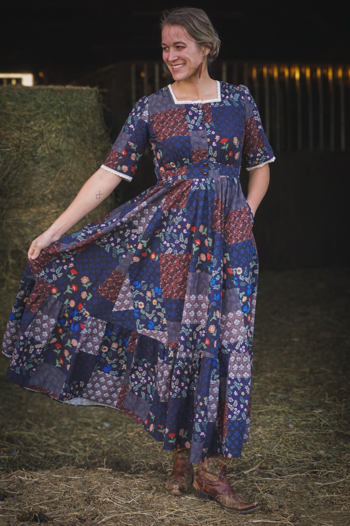 woman wearing a modest nursing patterned dress