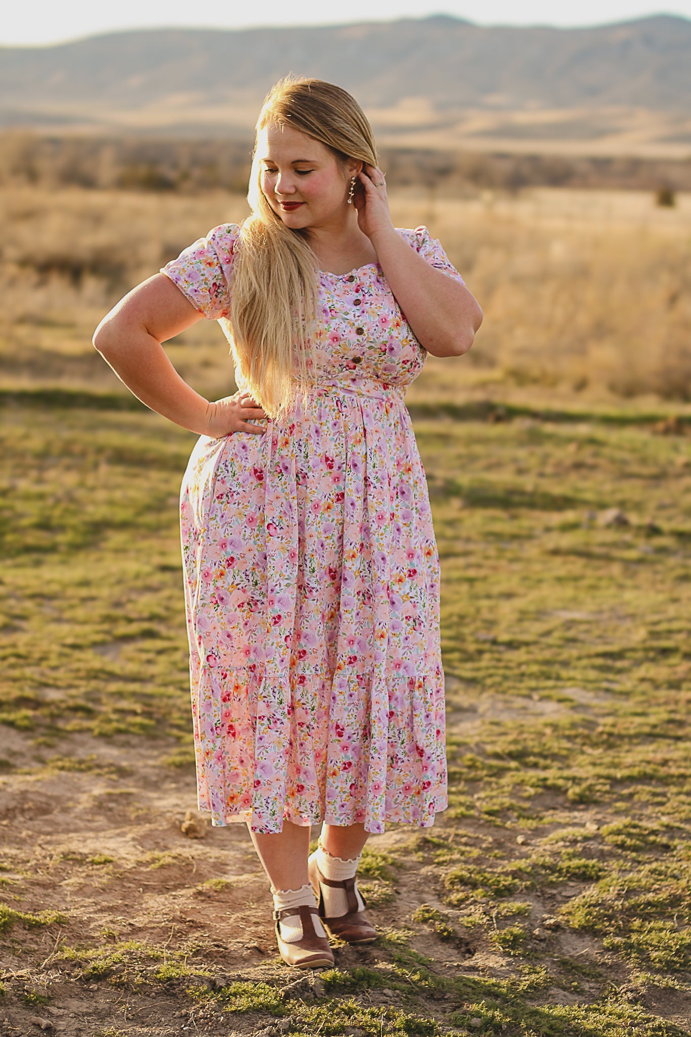 woman wearing a modest nursing floral dress
