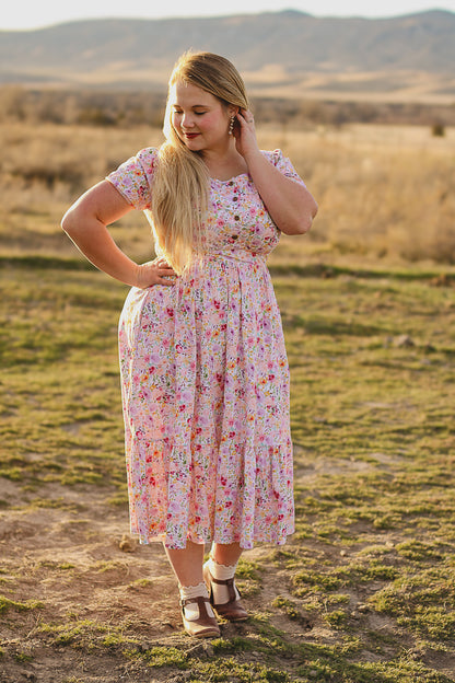 woman wearing a modest nursing floral dress