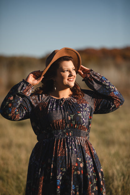 woman wearing a modest nursing floral dress